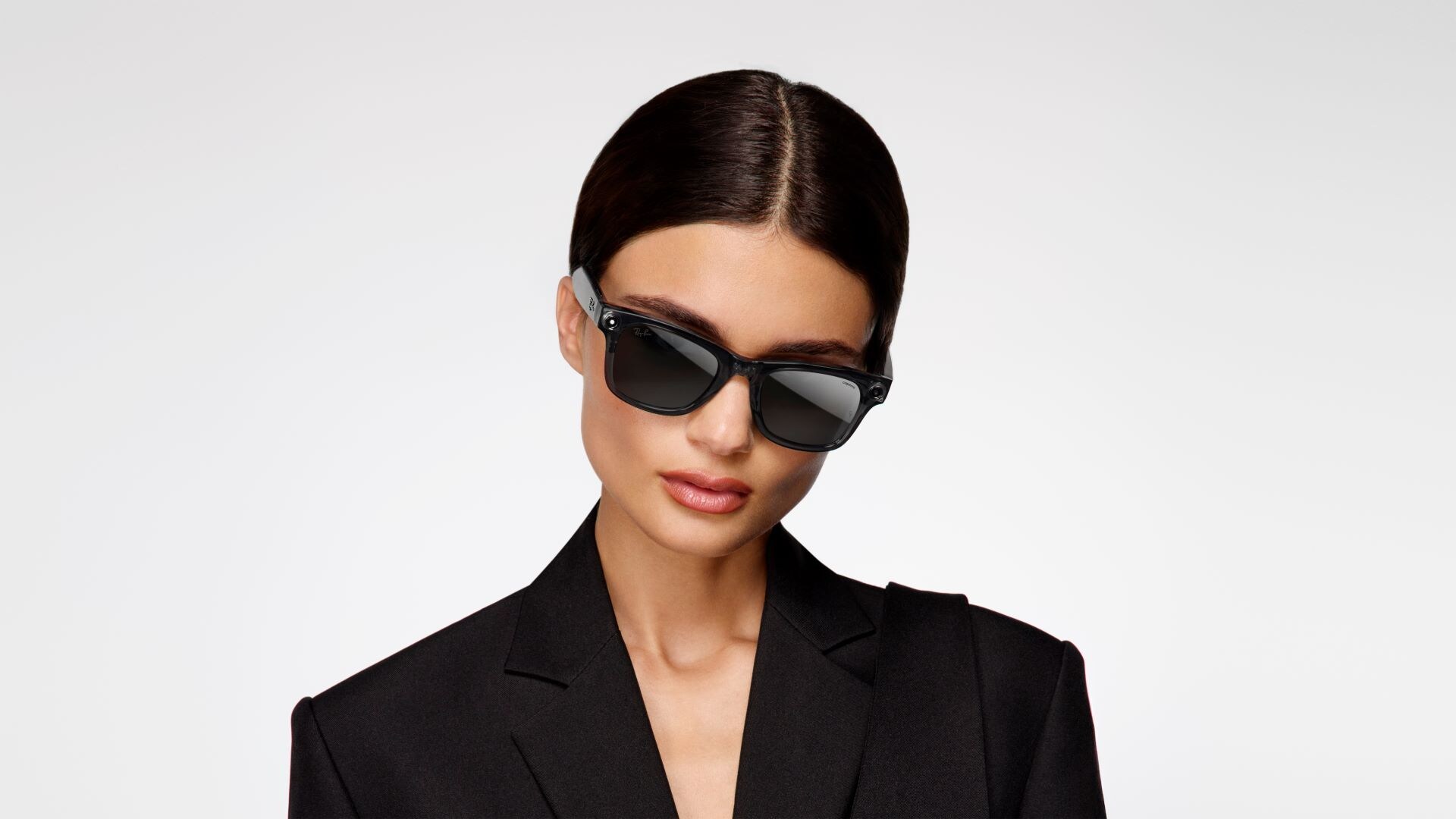 Woman wearing Ray-Ban Meta x Coperni smart glasses.